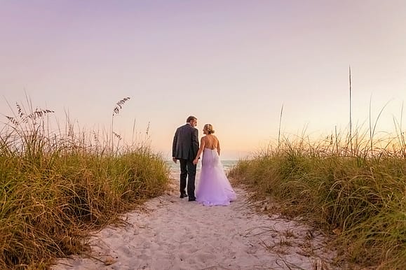 couple marries on beach.